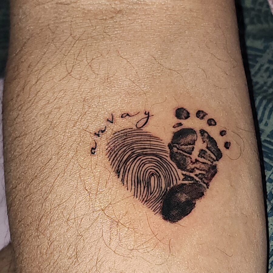 Heartfelt mother-son fingerprint and footprint tattoo