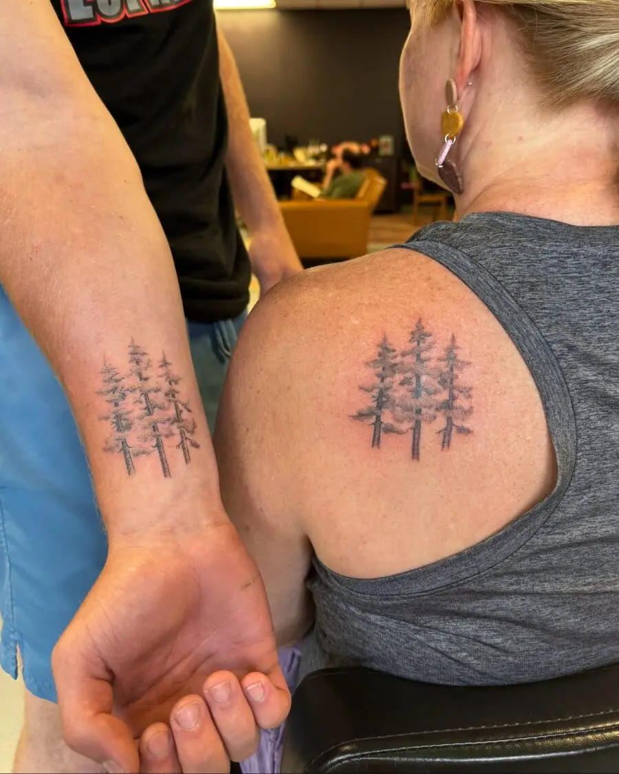 Symbolic forest tattoos celebrating a unique bond