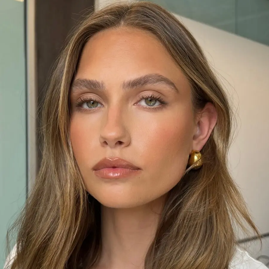Effortlessly radiant wedding guest makeup look