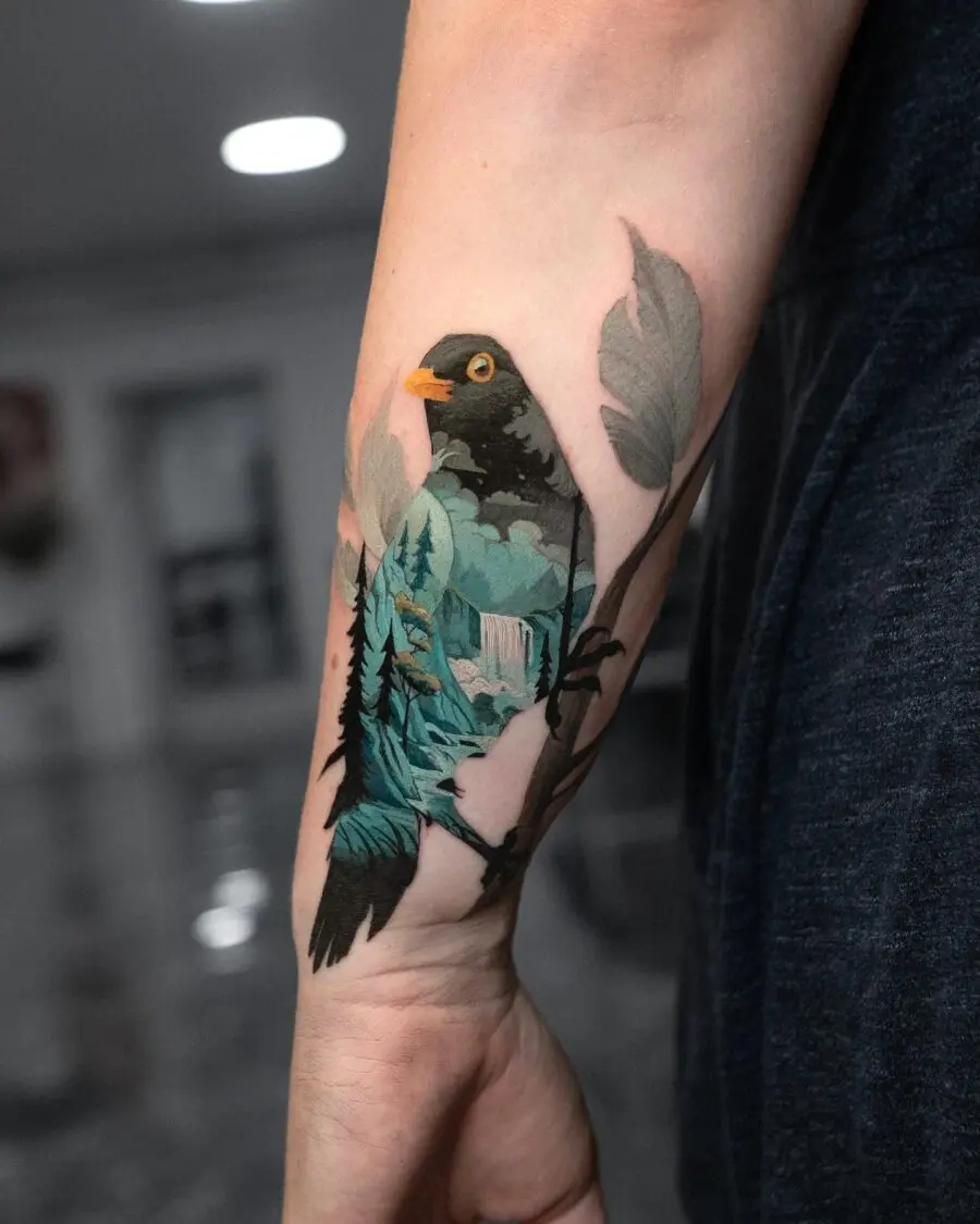 Vibrant bird with nature scene tattoo