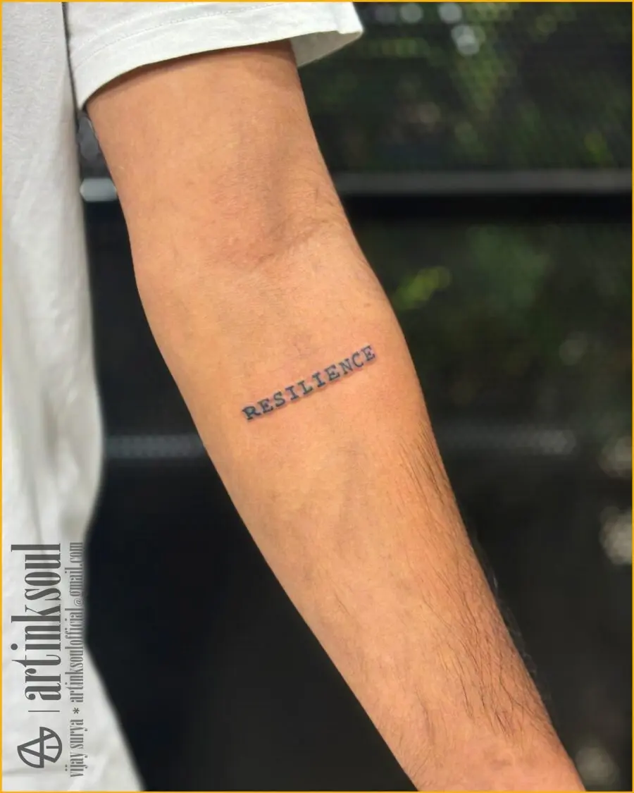 Symbolic one-word tattoo: Resilience on display