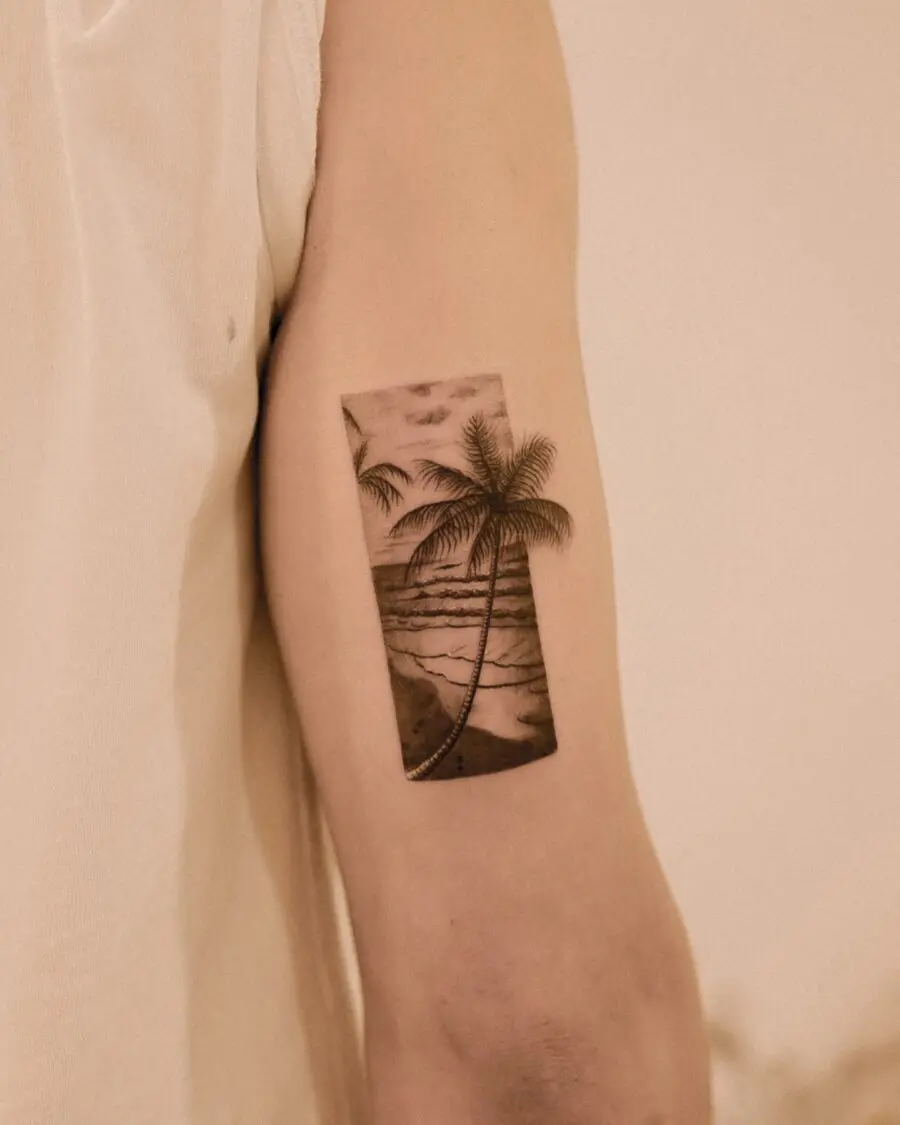 Stylish palm tree tattoo with vibrant scene