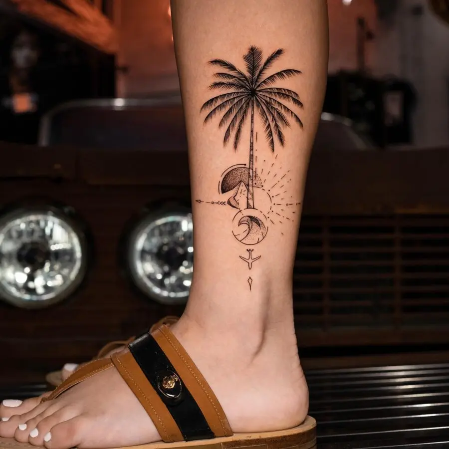 Elegant Palm Tree Tattoo with Celestial Elements
