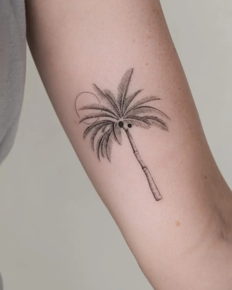 Elegant palm tree tattoo showcasing intricate details