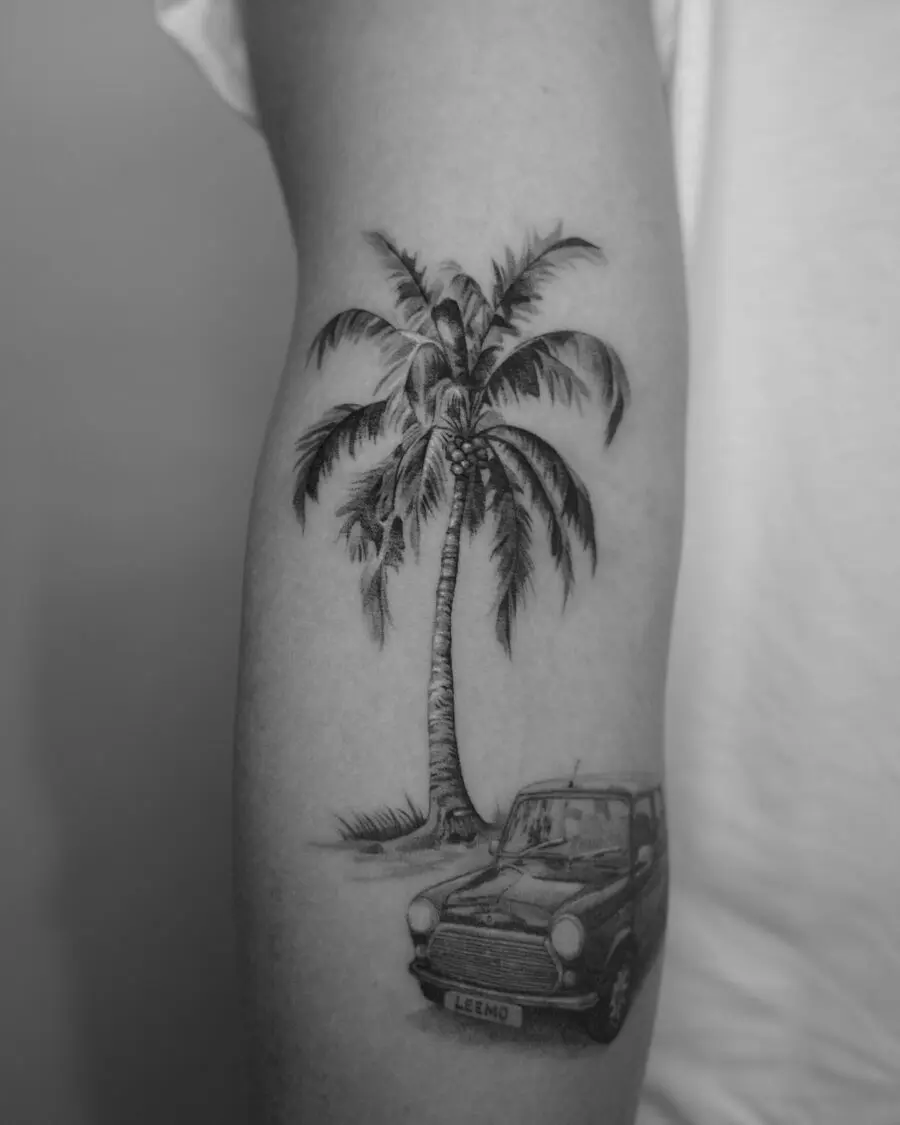 Stylish palm tree with vintage car tattoo