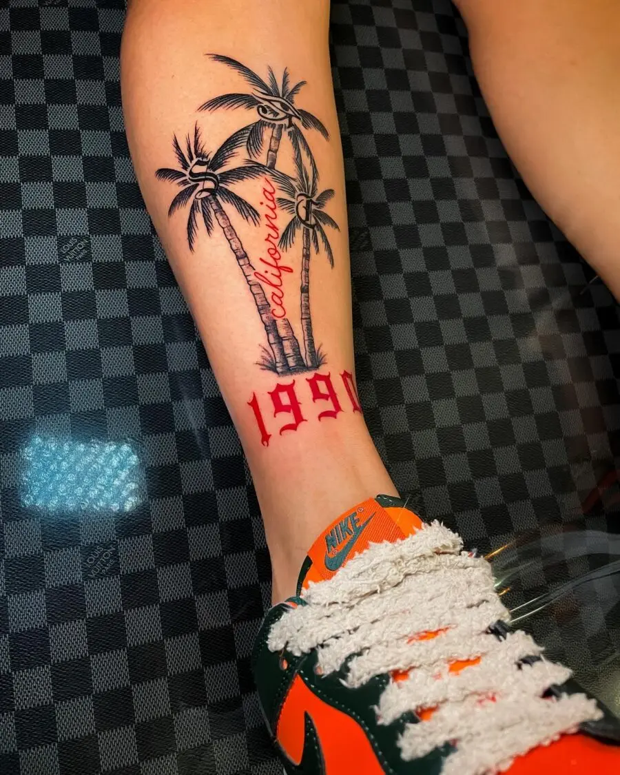 Stylish palm tree tattoo with vibrant colors