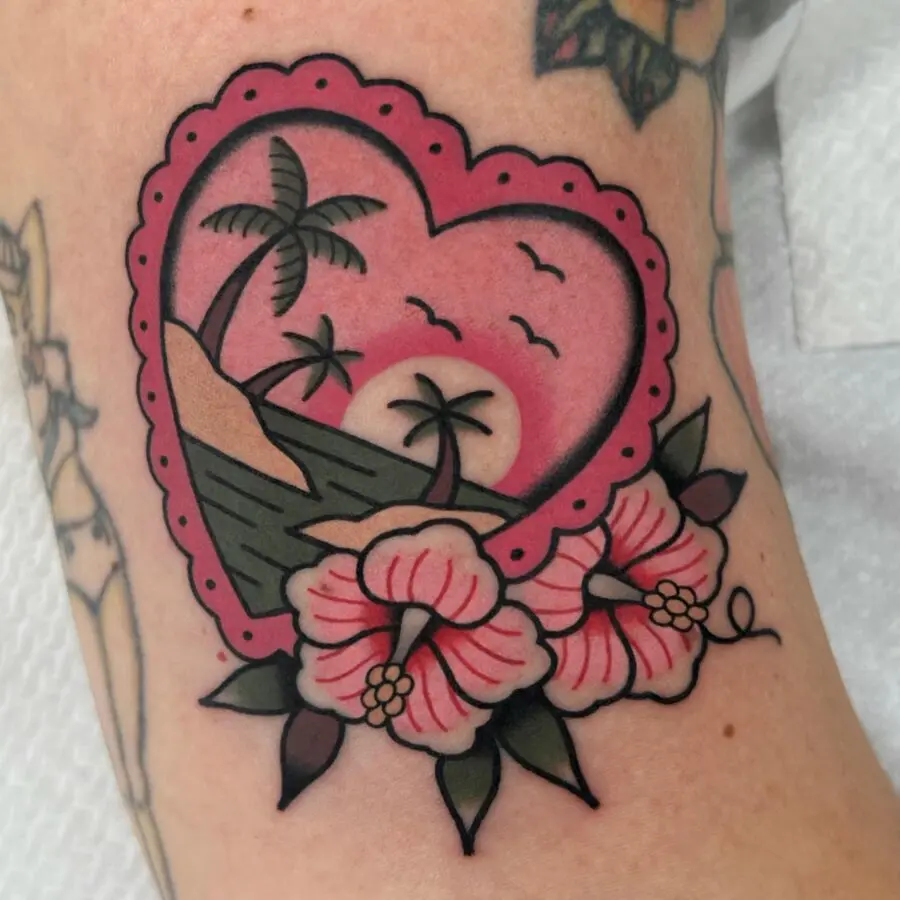 Vibrant palm tree heart-shaped tattoo design