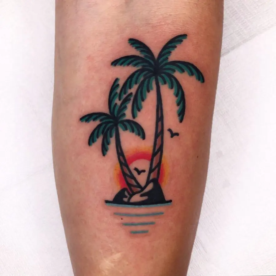 Vibrant palm tree tattoo with island backdrop