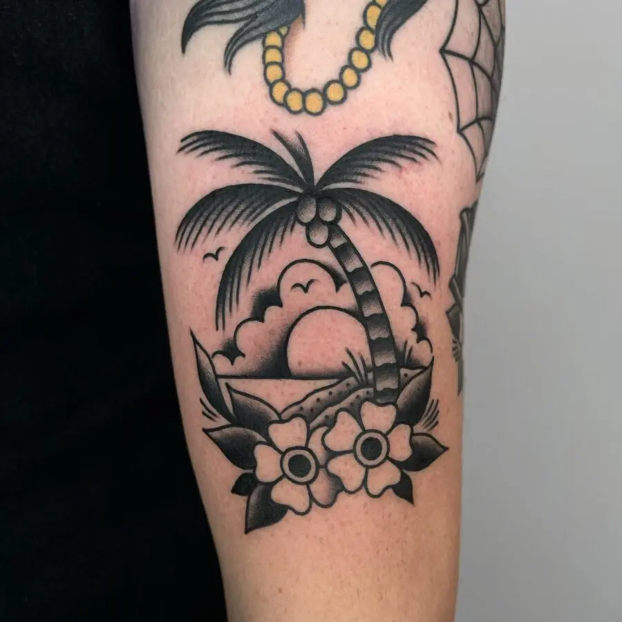 Delightful palm tree tattoo with sunset elements