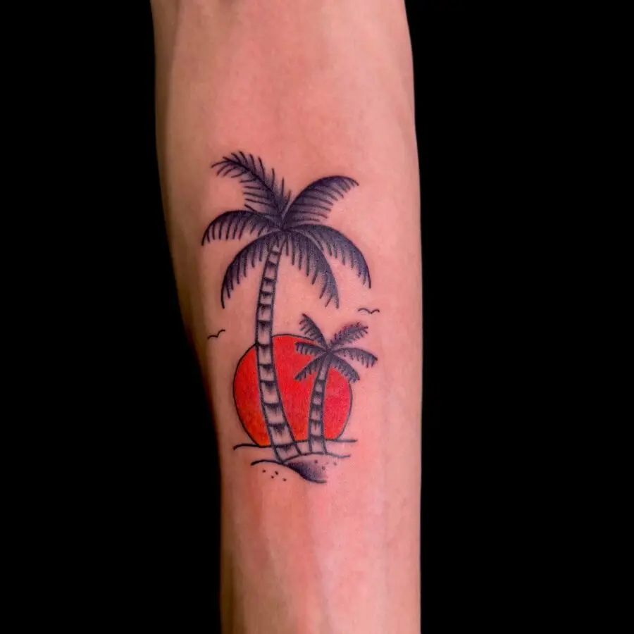Elegant palm tree tattoo with sunset backdrop