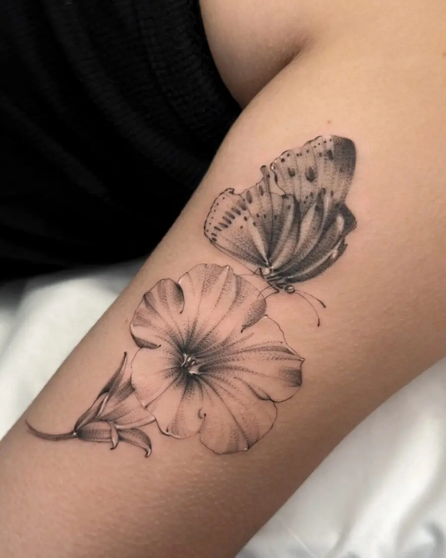 Elegant petunia and butterfly tattoo design
