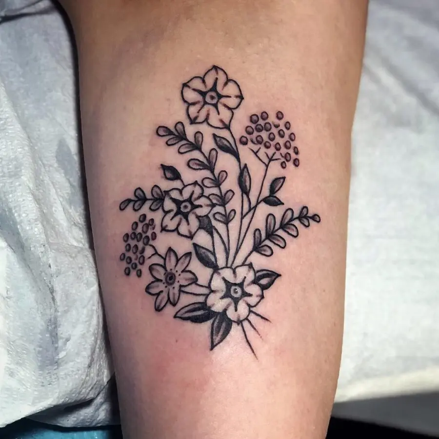 Elegant black line petunia tattoo design