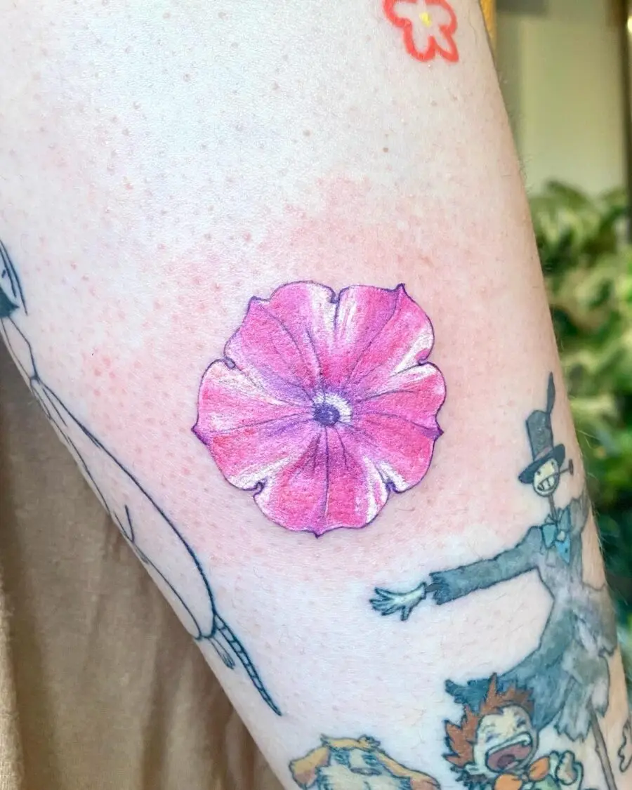 Charming petunia tattoo on arm