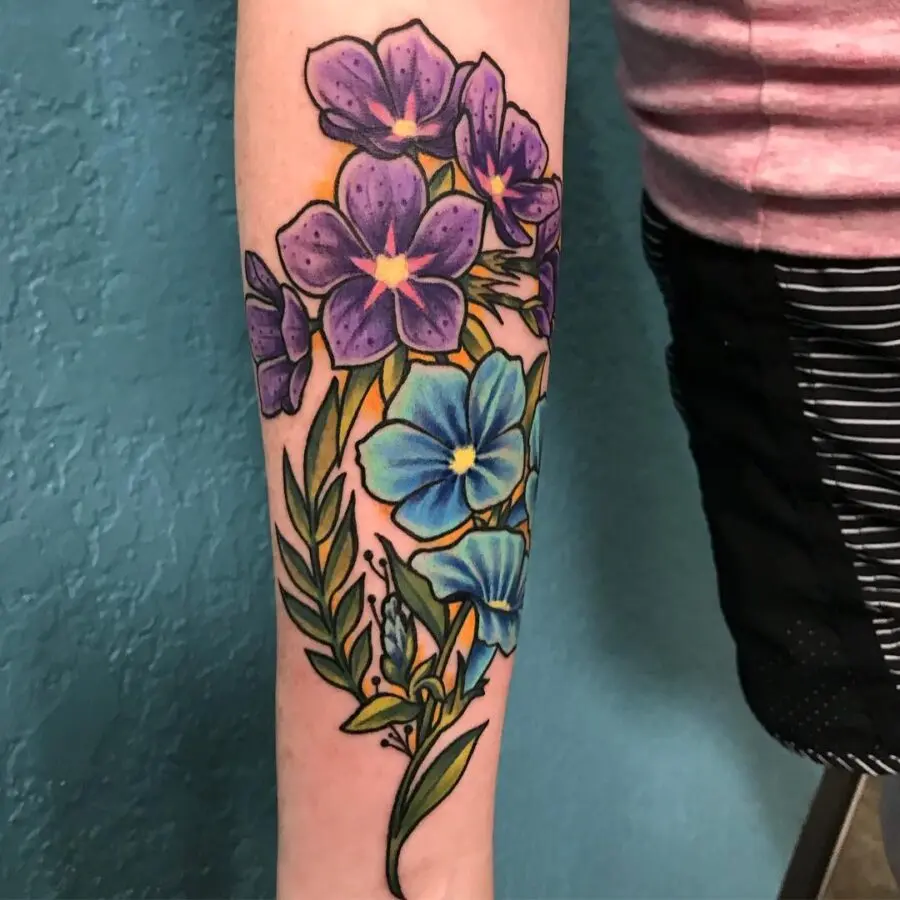 Vibrant Petunia Tattoo Design on Forearm