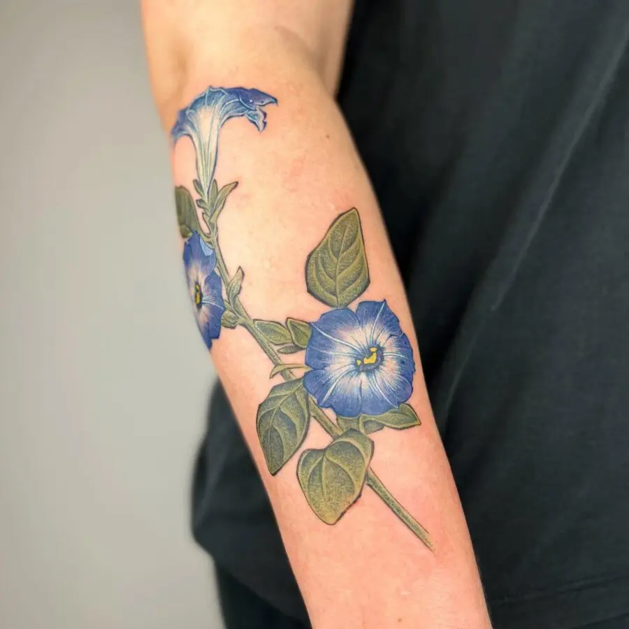 Vibrant Petunia Tattoo on Forearm