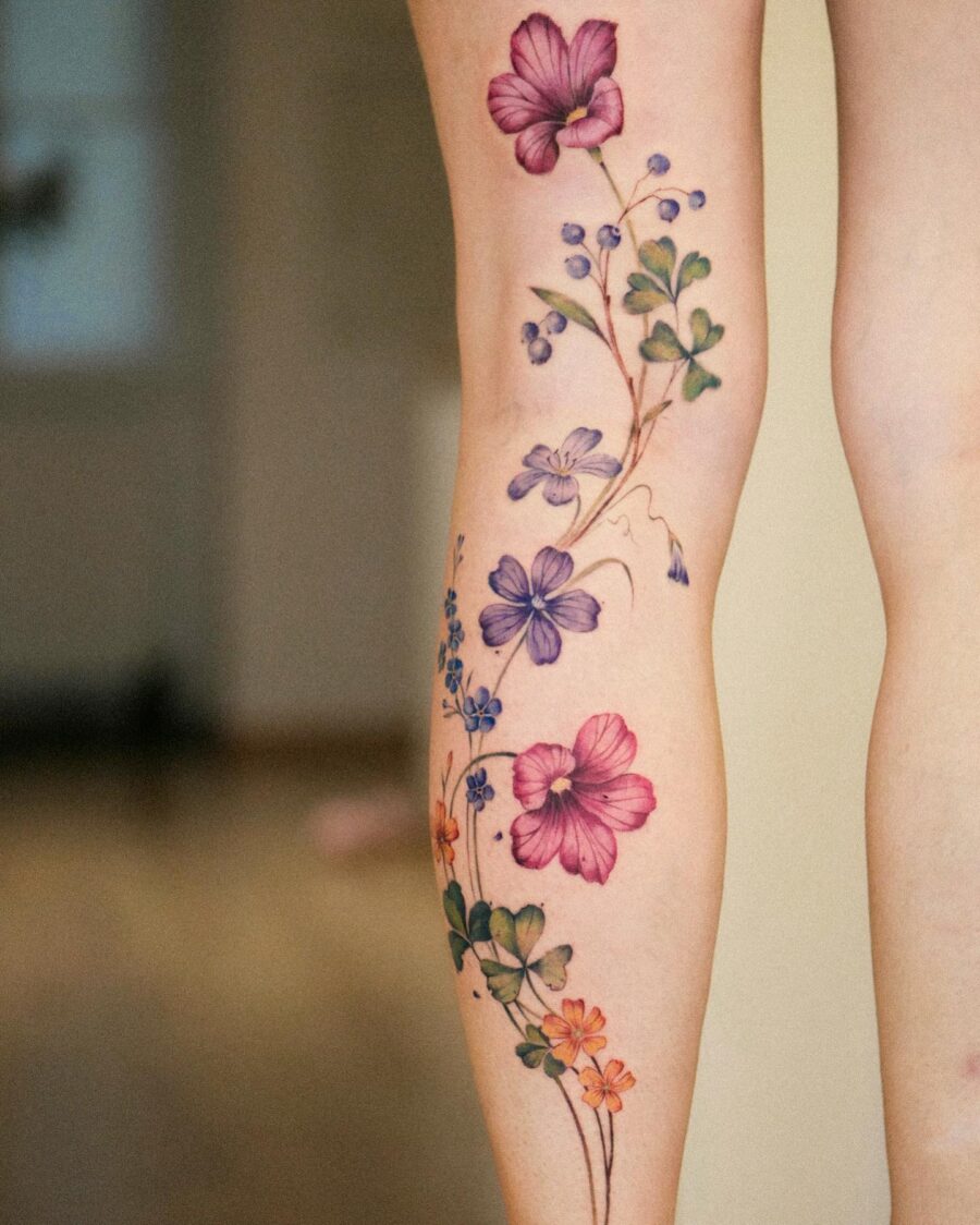 Vibrant Floral Tattoo on Calf