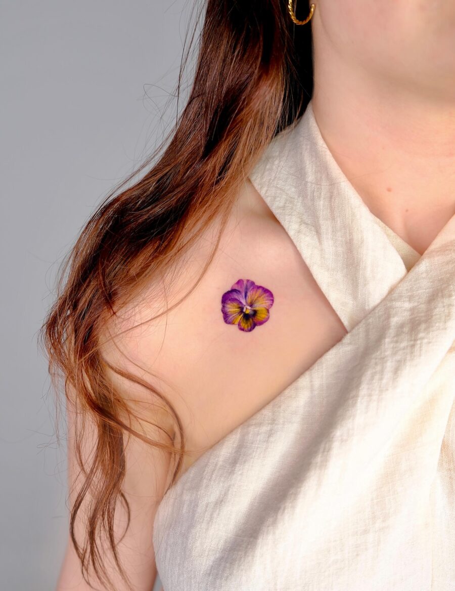 Delicate Petunia Tattoo on Woman's Shoulder