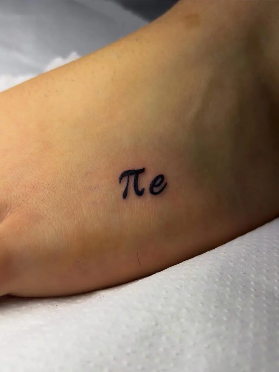 Elegant Pi Tattoo in Cursive Script