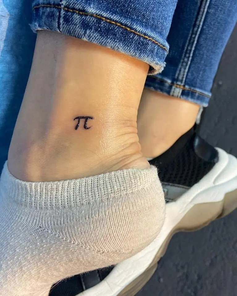 Elegant minimalist pi tattoo on the ankle.
