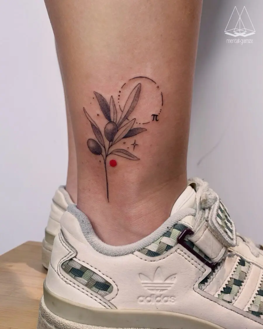 Elegant pi tattoo with floral accents on ankle