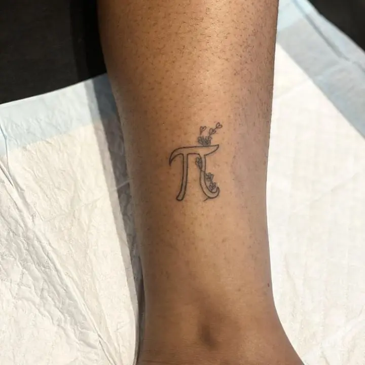 Whimsical pi symbol with floral accents