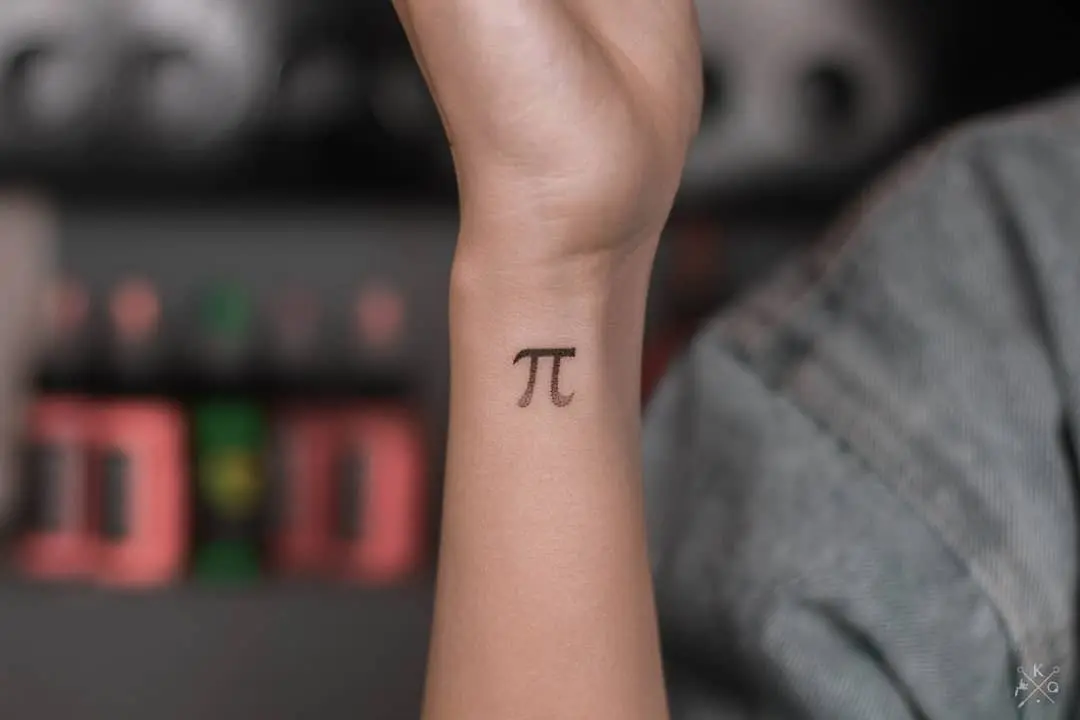 Sleek and simple pi tattoo on wrist