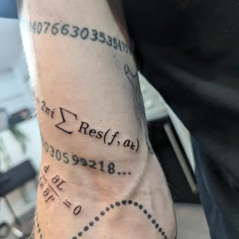 Unique mathematical pi tattoo design on arm
