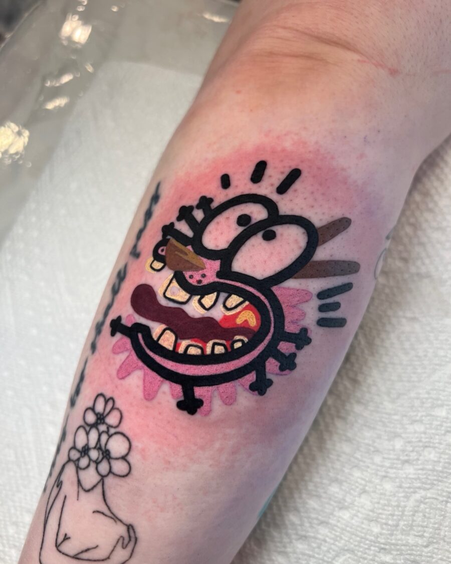 Unique cartoon tattoo featuring a quirky character