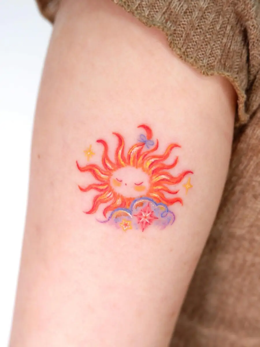 Charming sun tattoo representing joy and warmth