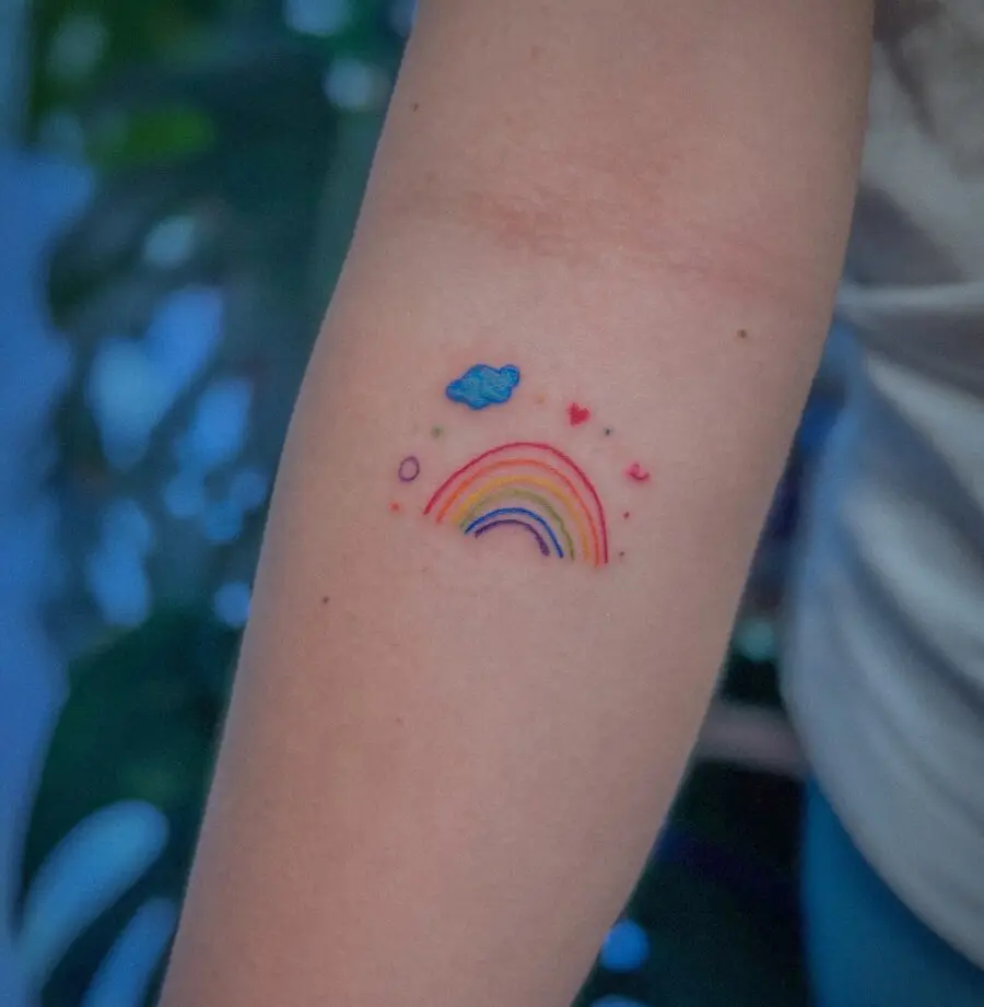 Charming Rainbow Baby Tattoo with Loving Elements