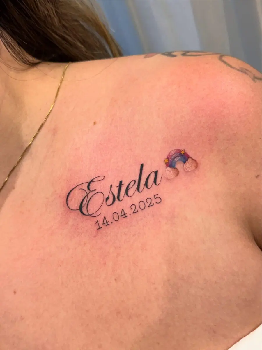Heartfelt rainbow tattoo honoring a lost child