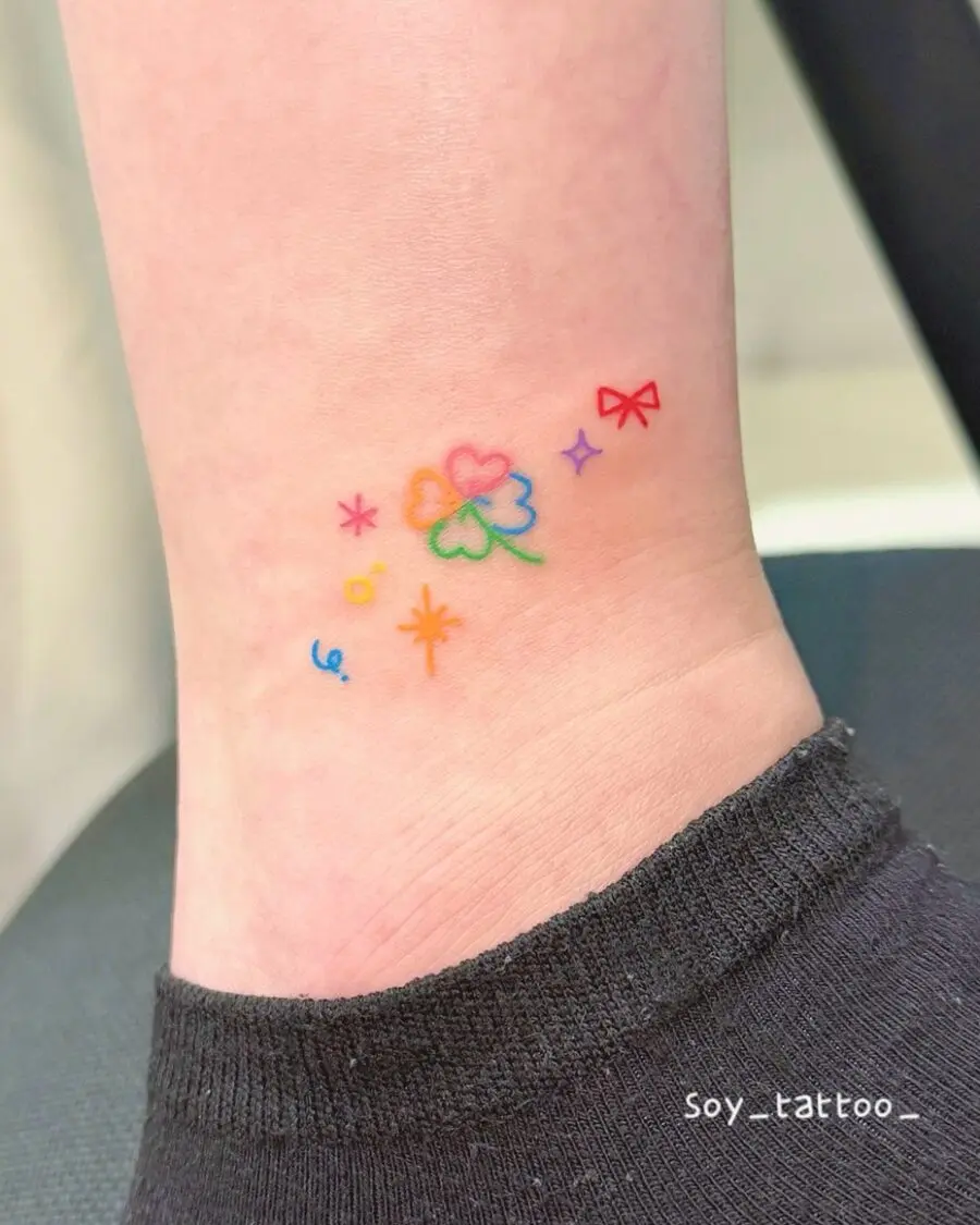 Delicate Rainbow Flower Tattoo With Joyful Accents