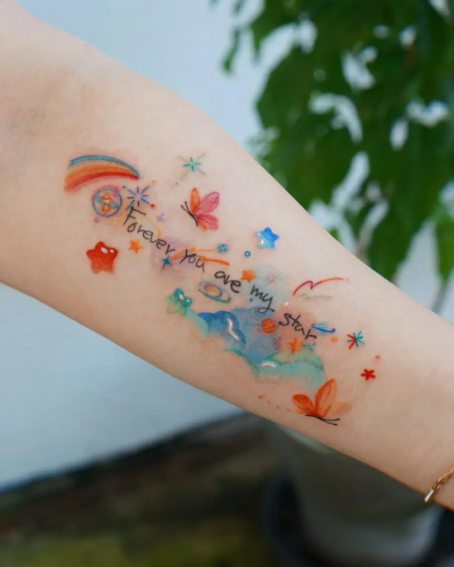 Vibrant rainbow baby tattoo celebrating love and hope