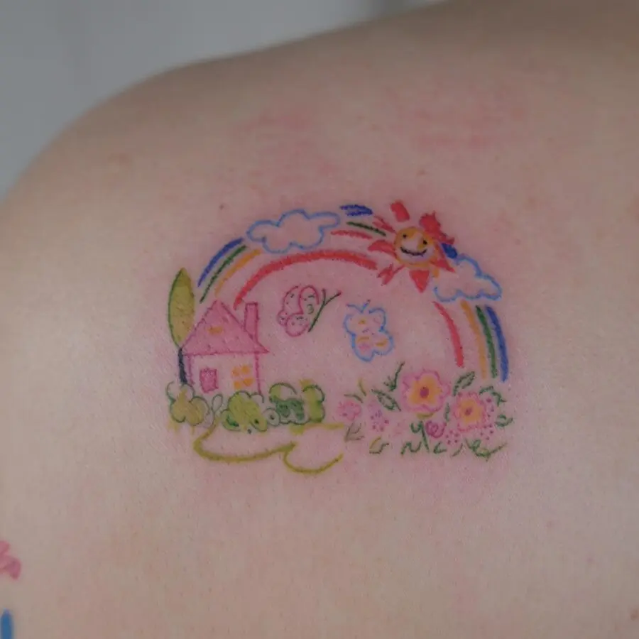 Whimsical rainbow baby tattoo with nature elements