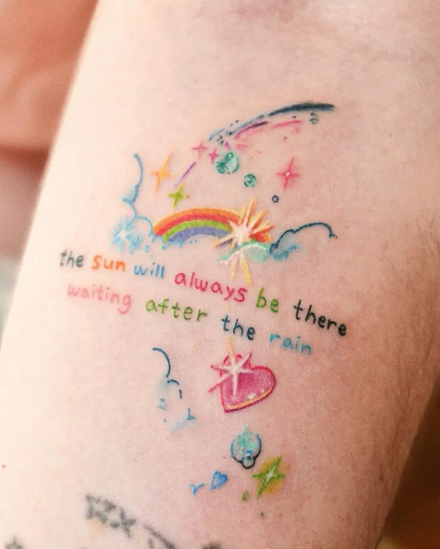 Colorful rainbow baby tattoo with a hopeful message
