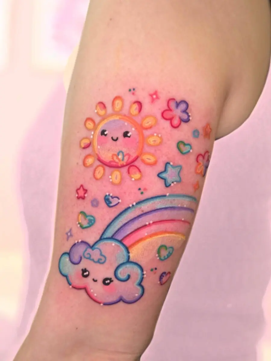 Vibrant rainbow baby tattoo with playful elements