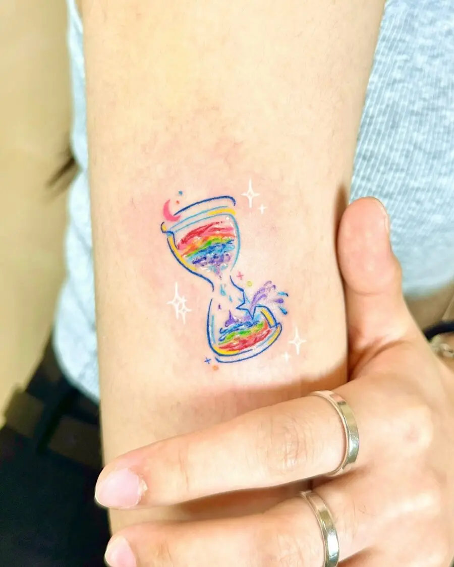 Vibrant hourglass tattoo symbolizing hope and renewal