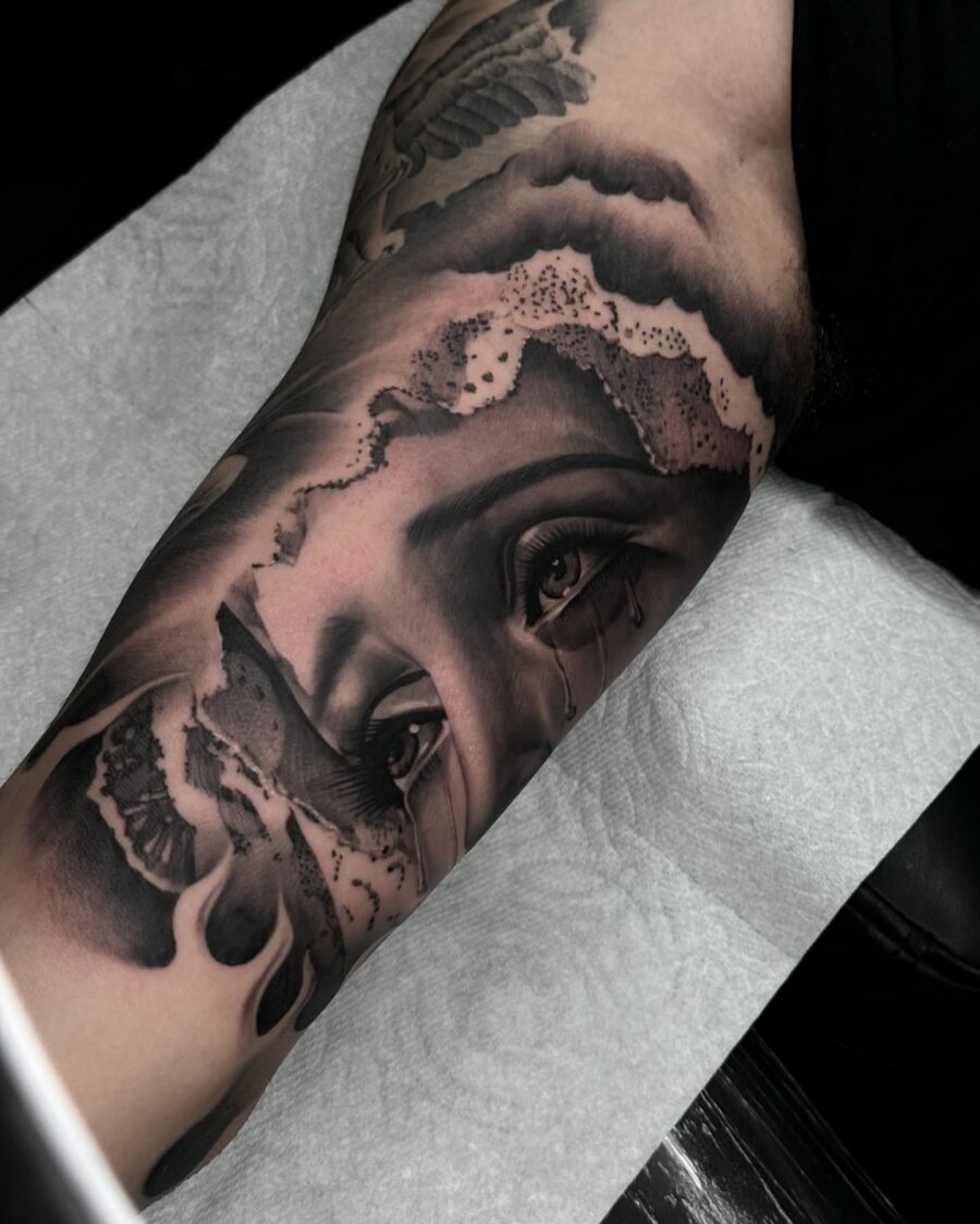 Stunning Eye Portrait Bicep Tattoo Design