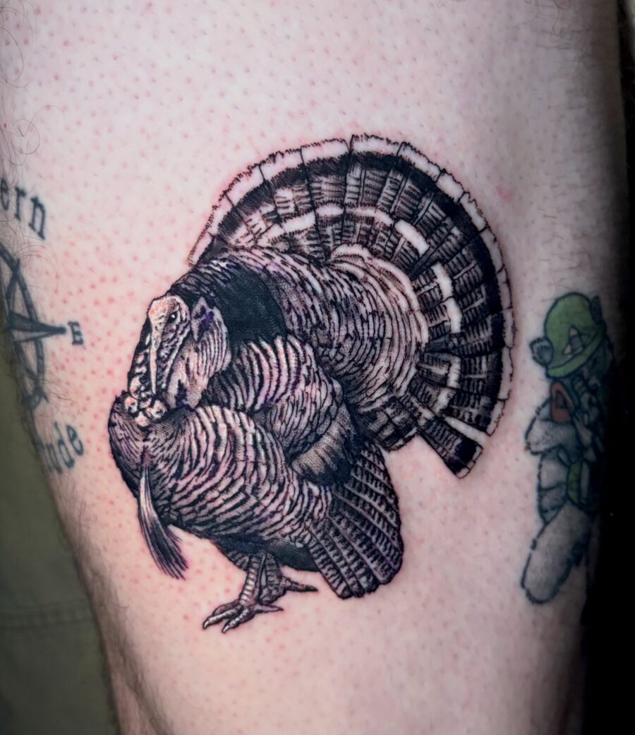 Detailed black and gray turkey tattoo design