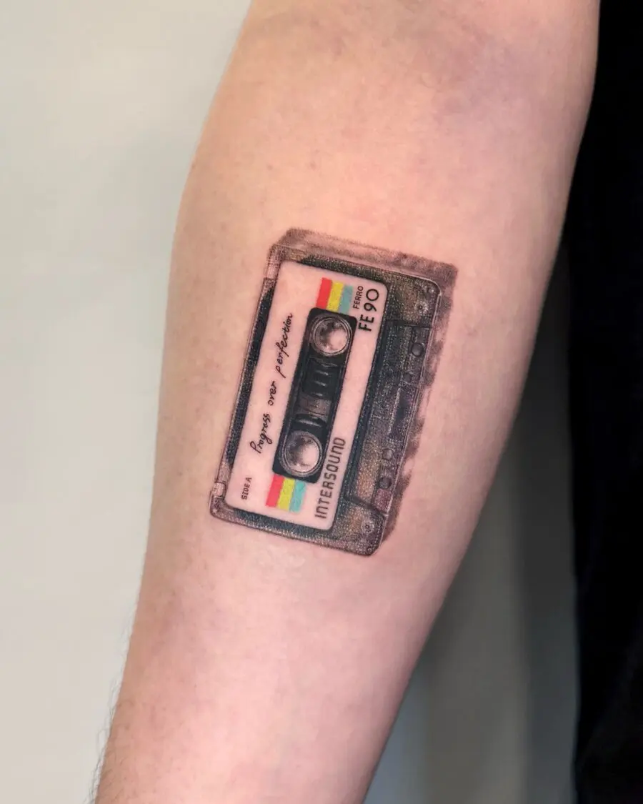 Unique cassette tattoo on forearm.