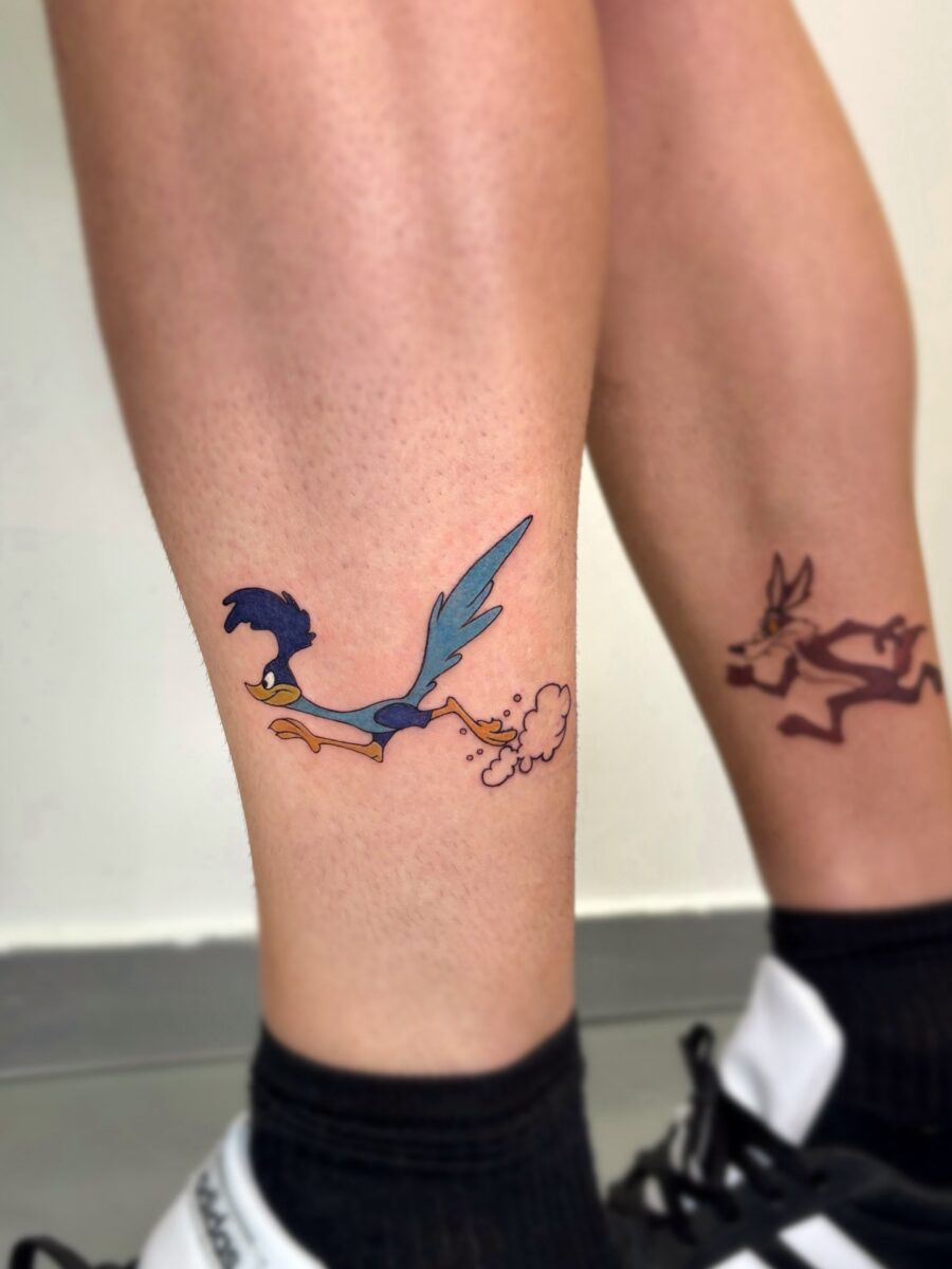 Playful Roadrunner and Coyote Cartoon Tattoos