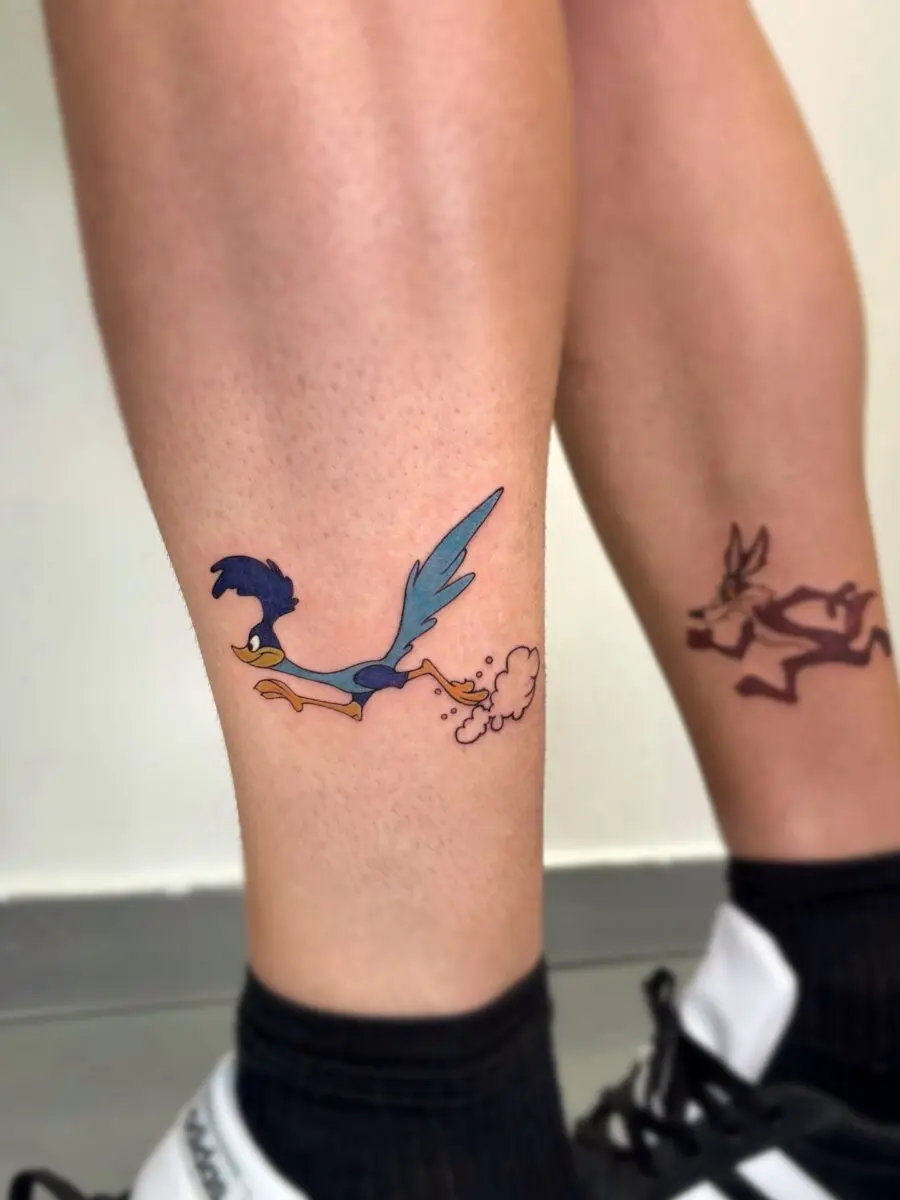 Playful Roadrunner and Coyote Cartoon Tattoos