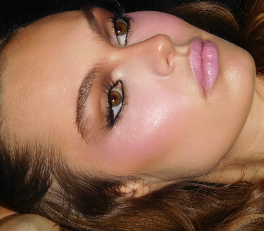 Radiant makeup accentuating round face features