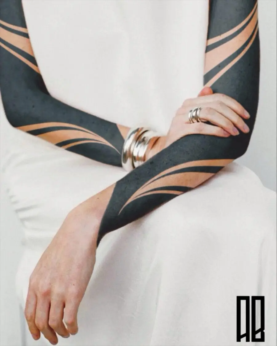Stylish Black Sleeve Tattoo with Smooth Lines