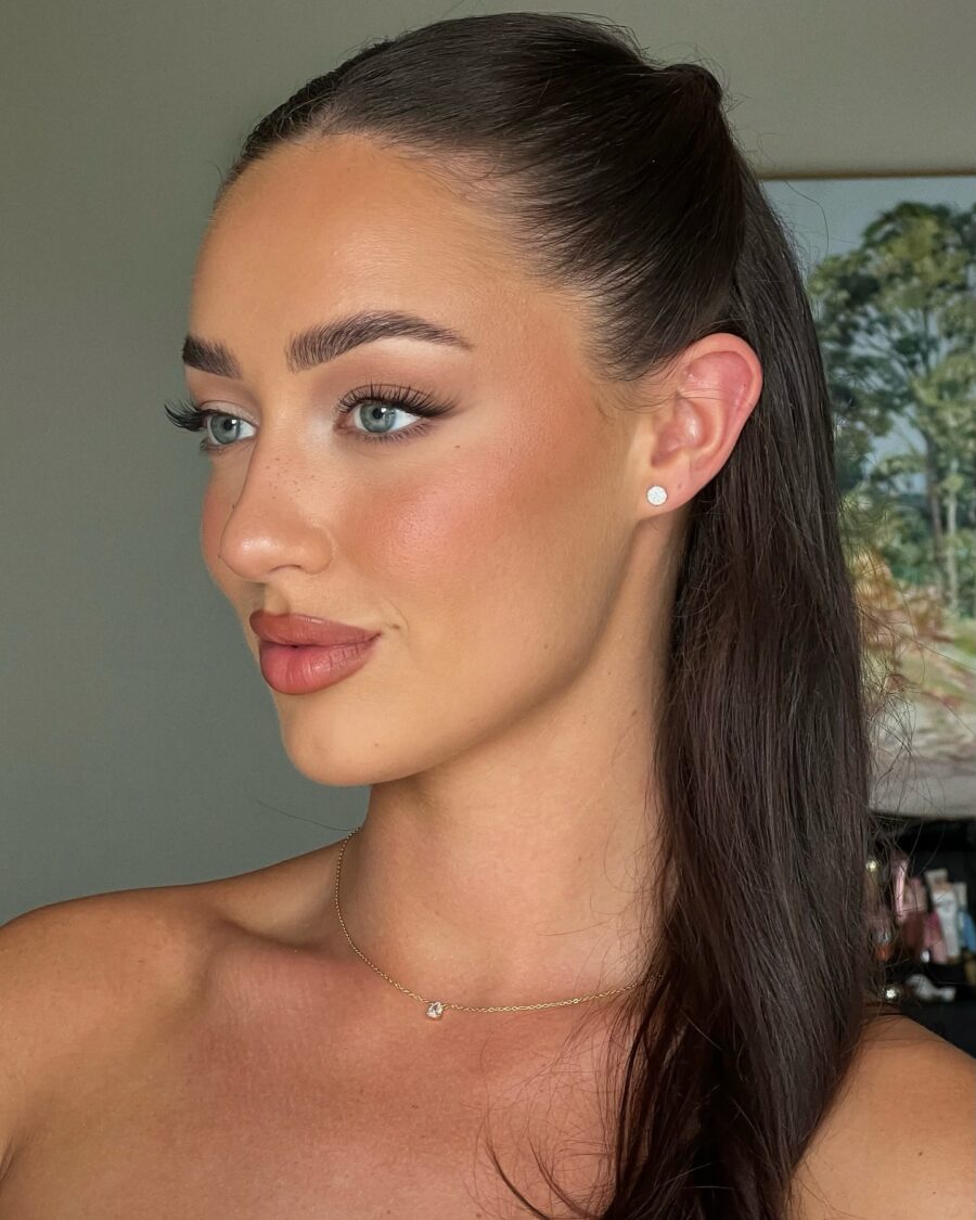 Elegant and fresh wedding guest makeup look.