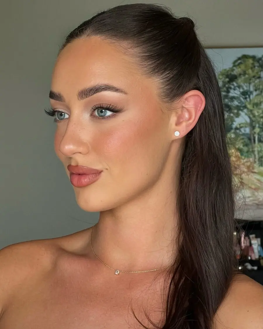 Elegant and fresh wedding guest makeup look.