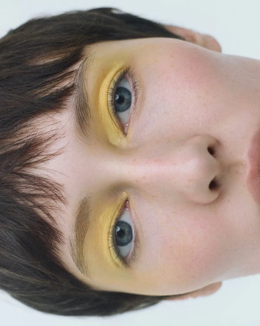 Bright yellow eyeshadow enhances small eyes beautifully.