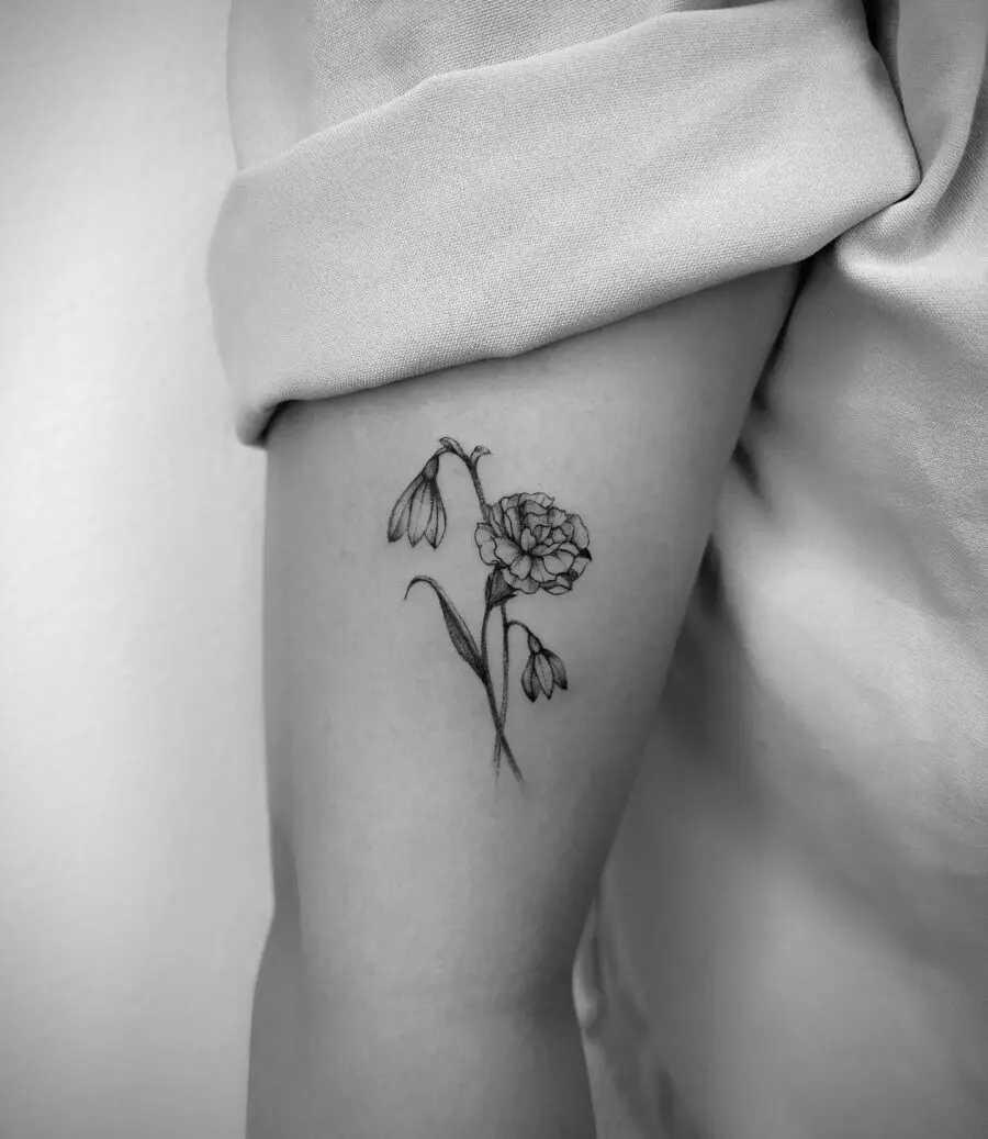 Stunning snowdrop flower tattoo on the arm