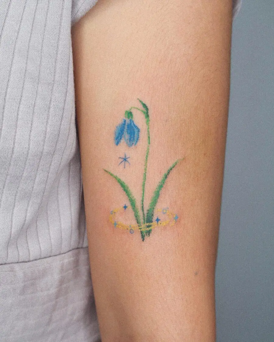 Delicate Snowdrop Flower Tattoo with Whimsical Touch