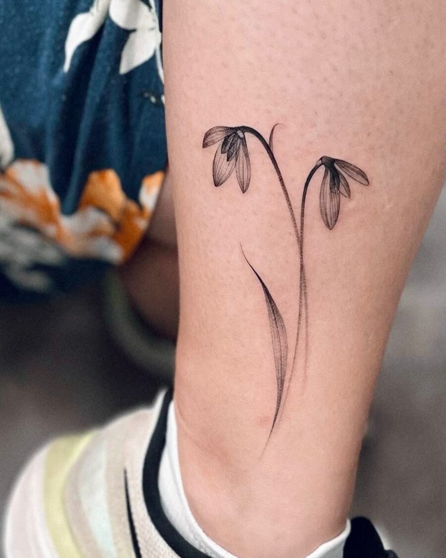 Elegant snowdrop tattoo design for minimalists